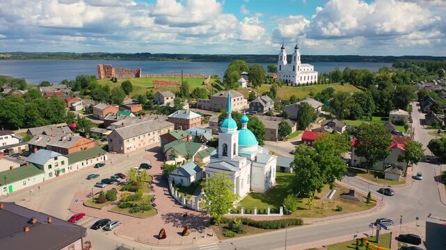 Aerial 4K video from drone to Ludza Orthodox Church of the Dormition of the Most Holy Mother of Godon a sunny summer day. Ludza, Latgale, Latvia 
