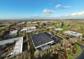 Aerial drone view of large scale cutting-edge technology and futuristic infrastructure of a large-scale data center in Milton Keynes, UK. AI cloud quantum computing. 
