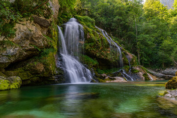 Fototapeta premium Serene Virje Waterfall in Soca Valley Triglav National Park Slovenia Natural Beauty