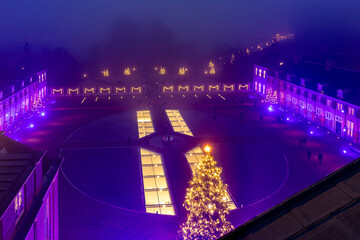 Apeldoorn, The Netherlands - December 20, 2025: View from roof of Royal Palace het Loo, National museum, illuminated in pink colors during Christmas period in Apeldoorn, The Netehrlands