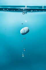 Slow Motion Macro of White Sleeping Pill Dissolving in Clear Liquid