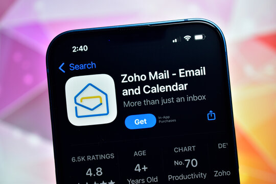 A close-up shot focusing on the application details page for the Zoho Mail - Email and Calendar app displayed on a dark smartphone screen. The app icon, title, and 'Get' button are visible against a b