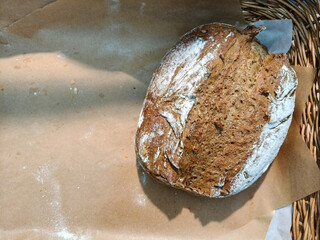 Sourdough bread in a basket with copy space.