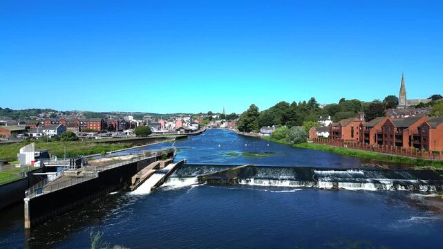 Exeter, South Devon, England: DRONE VIEWS: Low angle views of Trews Weir on the River Exe, just south of the city of Exeter. Exeter is a cathedral city and the county town of Devon (Clip 2 of 2).
