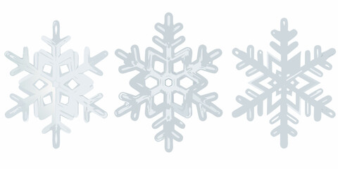 Three delicate white snowflakes displayed in a simple minimalistic arrangement