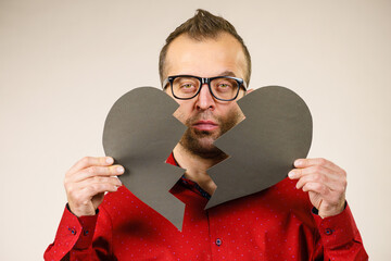 Sad man with broken heart.