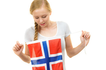 Girl holding norwegian flag