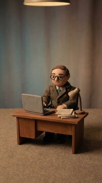 Clay animation business scene commerce at desk stopmotion creative environment