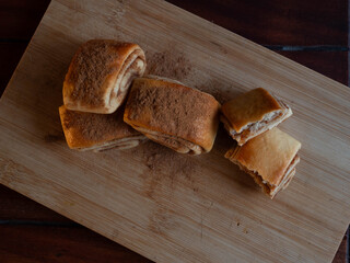 Top Down shot of Freshly baked cinnamon rolls dusted with spice
