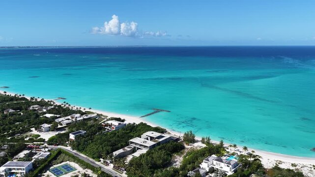 Leeward Beach In Providenciales Overseas Territory Turks And Caicos Islands. Turquoise Ocean Waves Gently Crashing On Tropical Beach. Shore Horizon Beach Sea. Outdoor Beach Panorama.