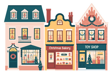 Naklejka premium Charming festive storefronts decorated for Christmas, creating a cozy holiday street scene.