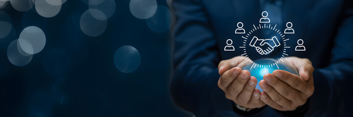 A person holding a glowing blue network connection symbol with people icons