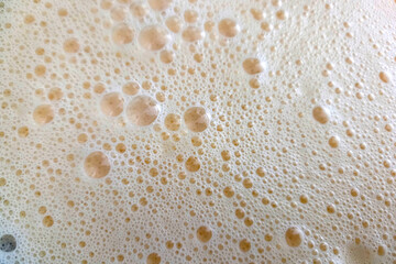 Bubbling Coffee Foam Texture Background for Beverage Design