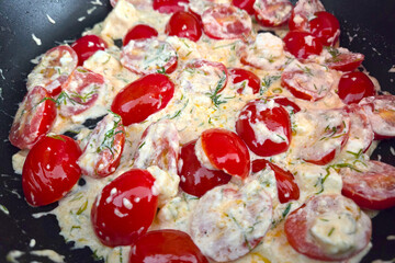 Fresh Cherry Tomatoes in Creamy Herb Sauce Perfect for Cooking Blogs and Recipes