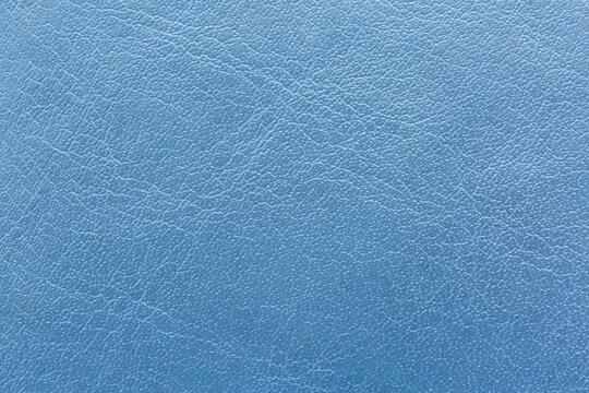 Gray leather surface macro,Gray leather texture close-up.Close-up of natural material for sewing products,Macro grey synthetic leather texture,Gray Leather Texture Close-up Photograph,