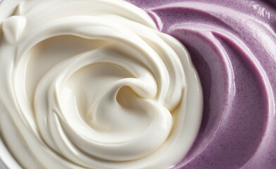 Sweet dessert texture. White creamy yogurt and purple blueberry yogurt. Healthy breakfast meal