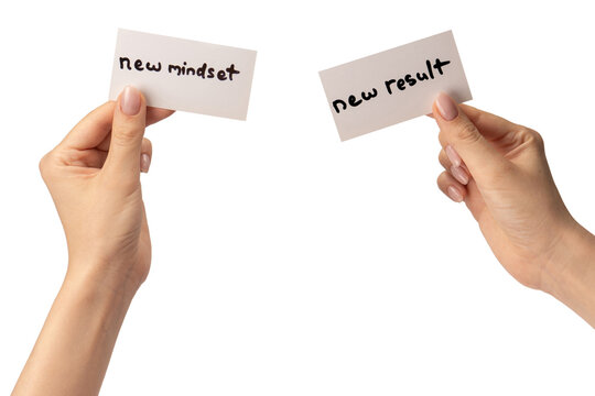 New mindset - new result  text on a card in a woman hand.