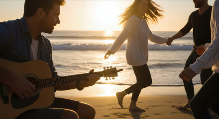 Young man playing acoustic guitar while friends dance on a sandy beach at sunset with warm golden backlight and ocean waves