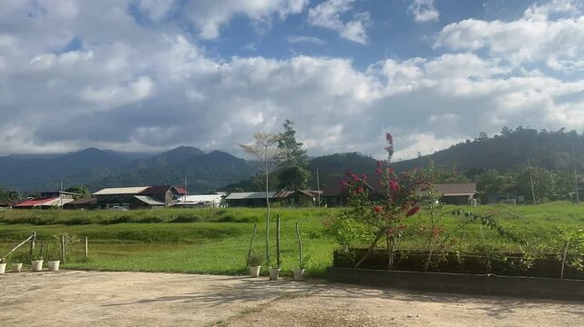 Cloudy Sky Over Rural Village and Mountain Landscape at Bario, Sarawak