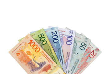 Argentine money. Paper banknotes, Argentinian peso bills arranged in a fan on a transparent background. Rewerse.  Financial business concept. Flat lay, copy space. Close up