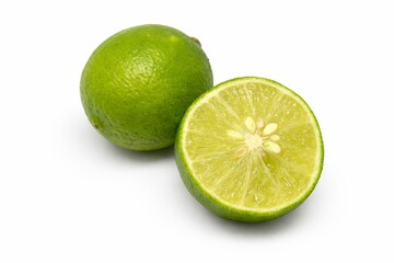 Fresh Whole and Sliced Lime Isolated on White Background