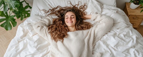 Relaxed woman enjoying tranquility in cozy bedroom with plants