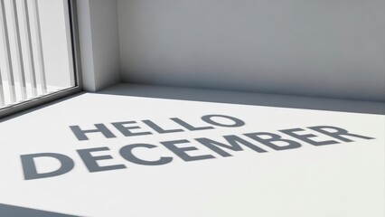 Hello December Text Shadow on White Floor with Natural Light.
