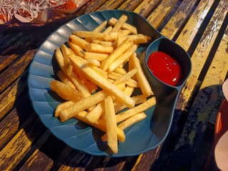 French fries with tomato sauce