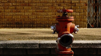 red fire hydrant on sidewalk