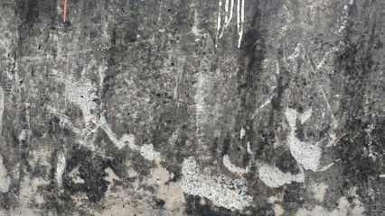 The concrete surface feels coarse and irregular