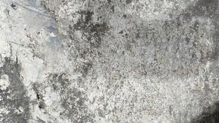 The surface of the concrete is rugged and uneven