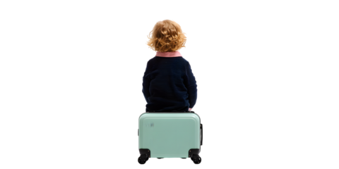 Child sitting on suitcase isolated on white background