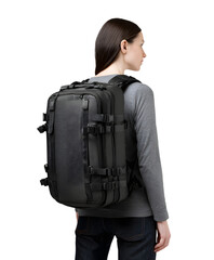 Woman carrying large black backpack isolated on white background