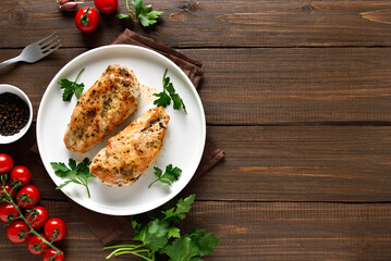 Homemade roasted chicken breast on plate