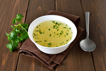 Chicken broth in bowl