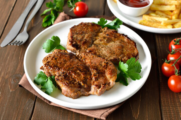 Juicy grilled pork steaks