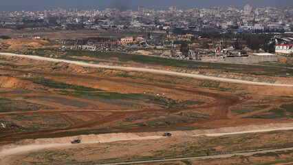 Aerial IDF Merkava Tanks and Humvee Patrol in Gaza
showing IDF Merkava tanks and Humvee vehicles...