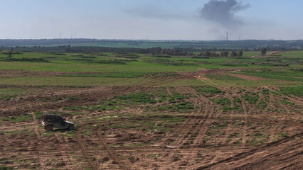 Aerial IDF Humvee Patrol Near Gaza Border
showing an IDF Humvee vehicle patrolling near the Gaza border in 2024.
