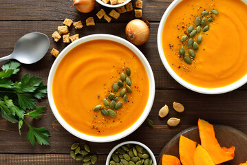Homemade creamy pumpkin soup in bowl