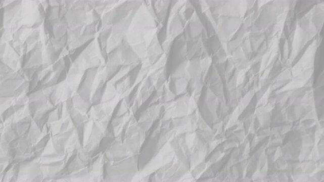 crumpled scrap coloured paper alternating motion animated background with strobe jump cut stop frame animation motion background wallpaper effect 4K