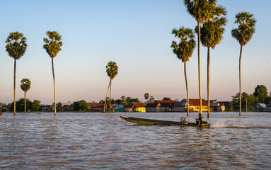 Bugis fisherman's boat at sunset on Lake Tempe, Sulawesi, Indonesia
