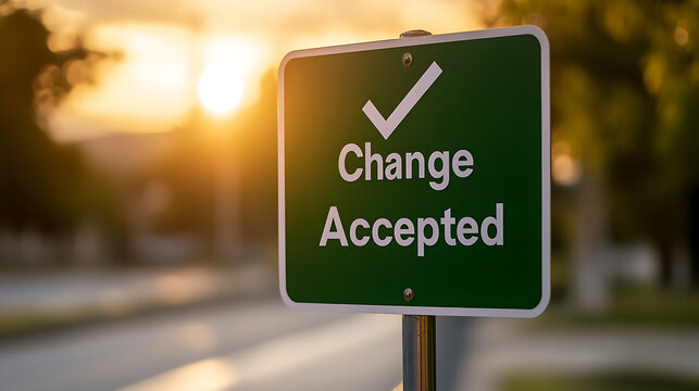 Embrace change with a positive outlook! This image captures a sign that reads 'Change Accepted,' against a bright sunset backdrop. Symbolizing adaptation and forward motion.