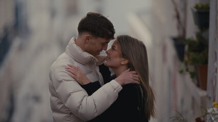 A romantic couple embraces in a Paris street France sharing a loving and intimate moment The couple...