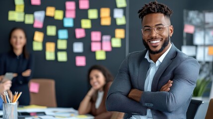A man in a suit is smiling