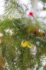 Spruce branches decorated with New Year and Christmas decorations