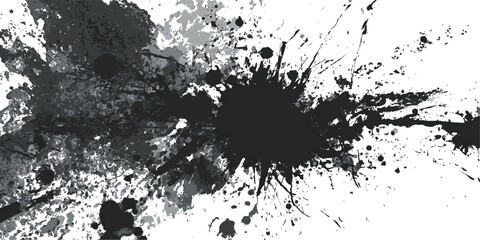 A dynamic and artistic image featuring a large, black paint splatter on a white background