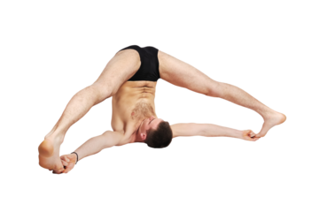 Man stretching doing yoga.