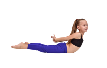 Girl in yoga pose wearing blue leggings and black crop top