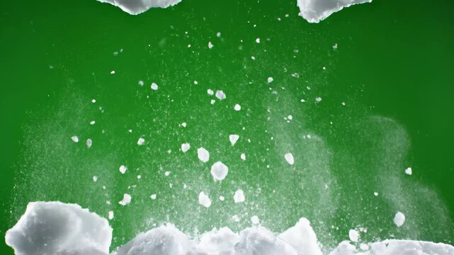 Green Screen Heavy Wet Snow Clumps Falling and Breaking Apart in Studio