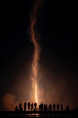 rocket launches at dawn with silhouette of people